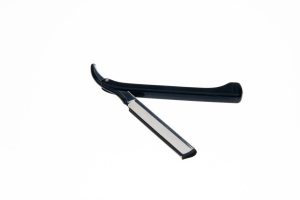 rasoir de coiffure sur fond blanc